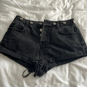 Black jean shorts with buttons